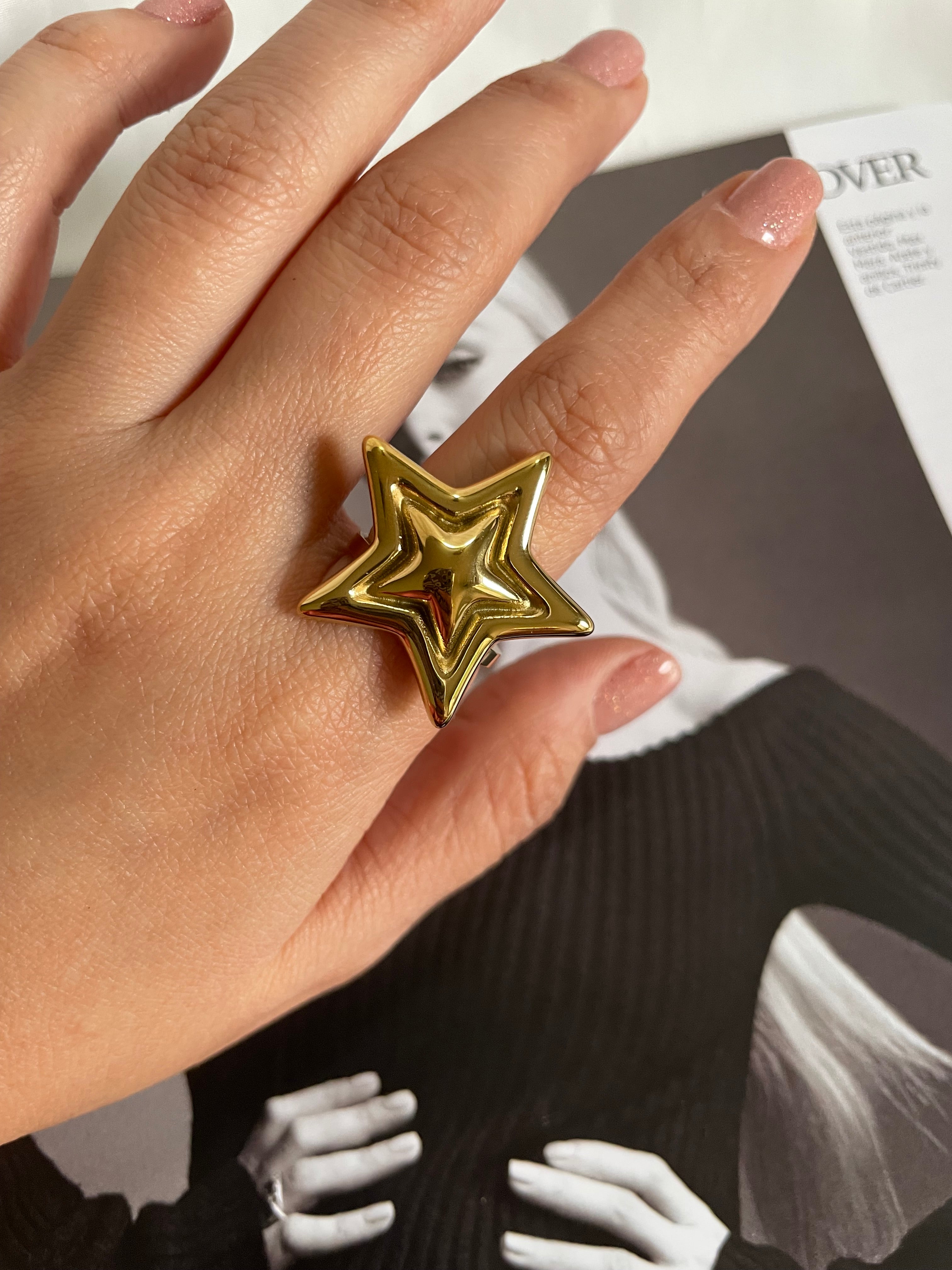 Anillo estrella dorado